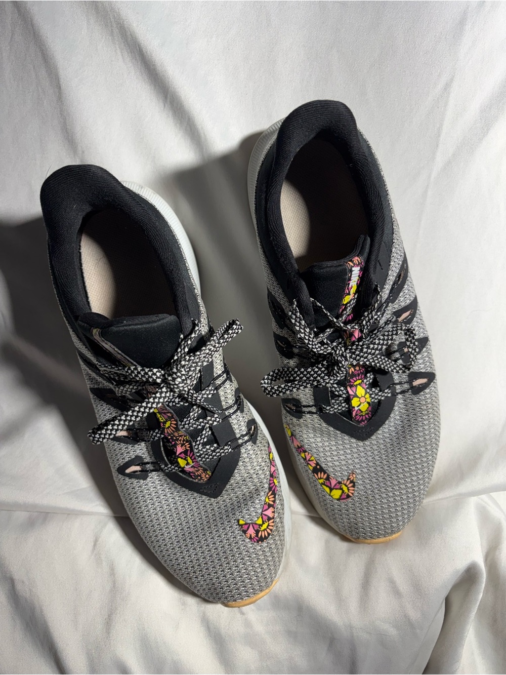 Nike Women’s Gray Athletic Sneakers with Floral Swoosh Accents